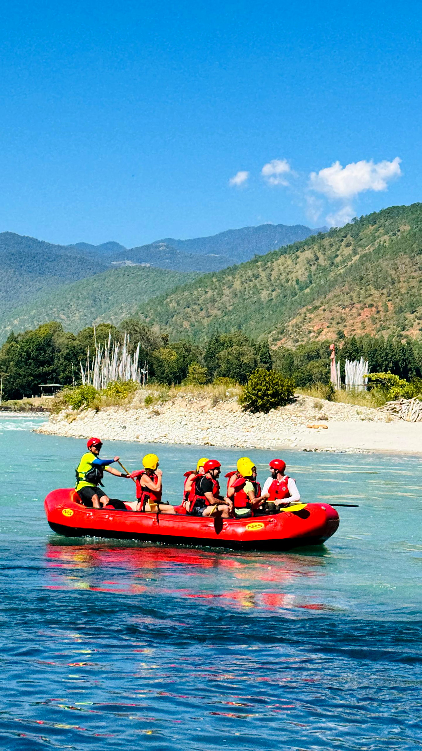 A Beetle Travels guide briefing guests before rafting in Punakha