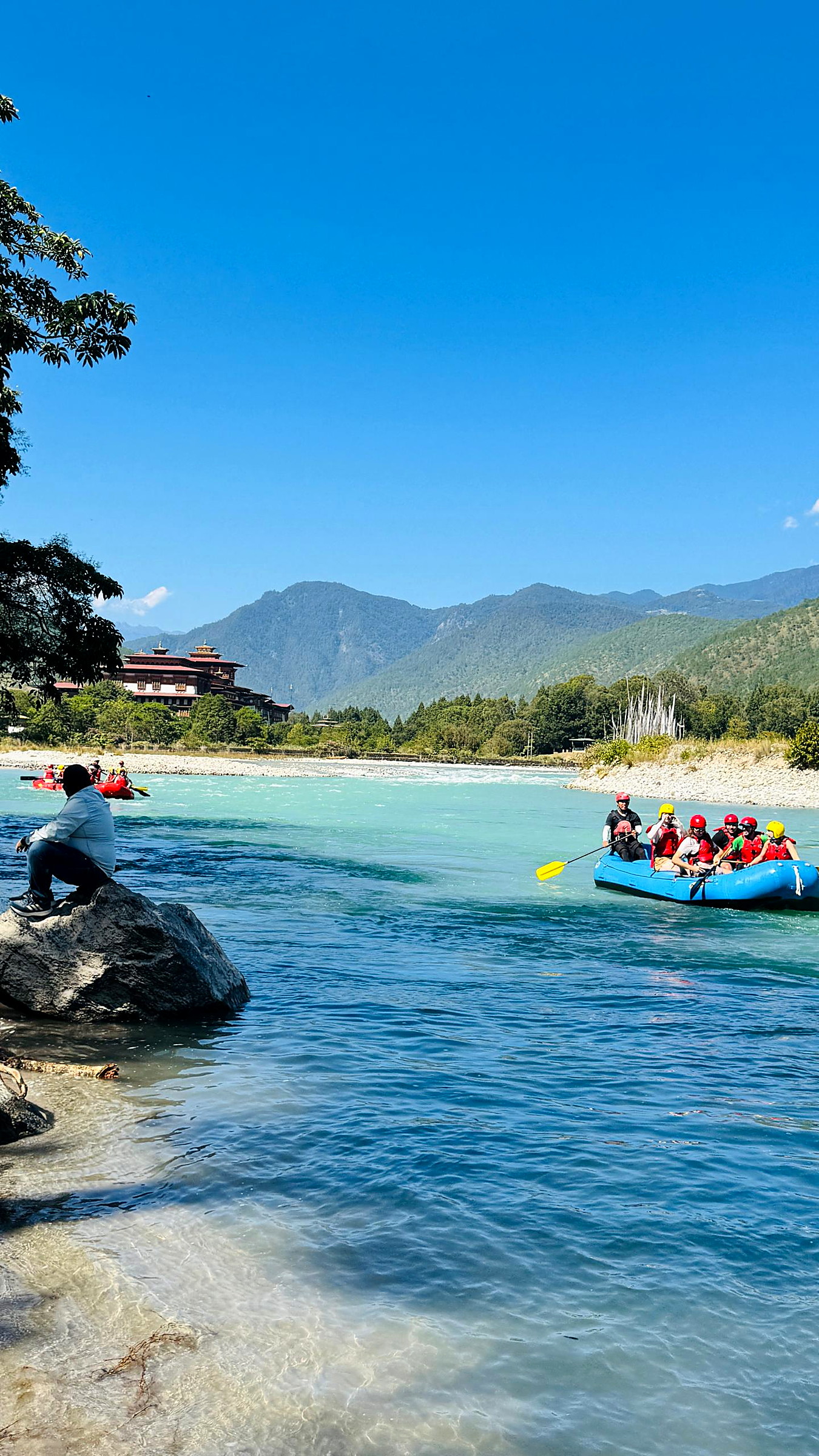 Rafting past Punakha Dzong on the river