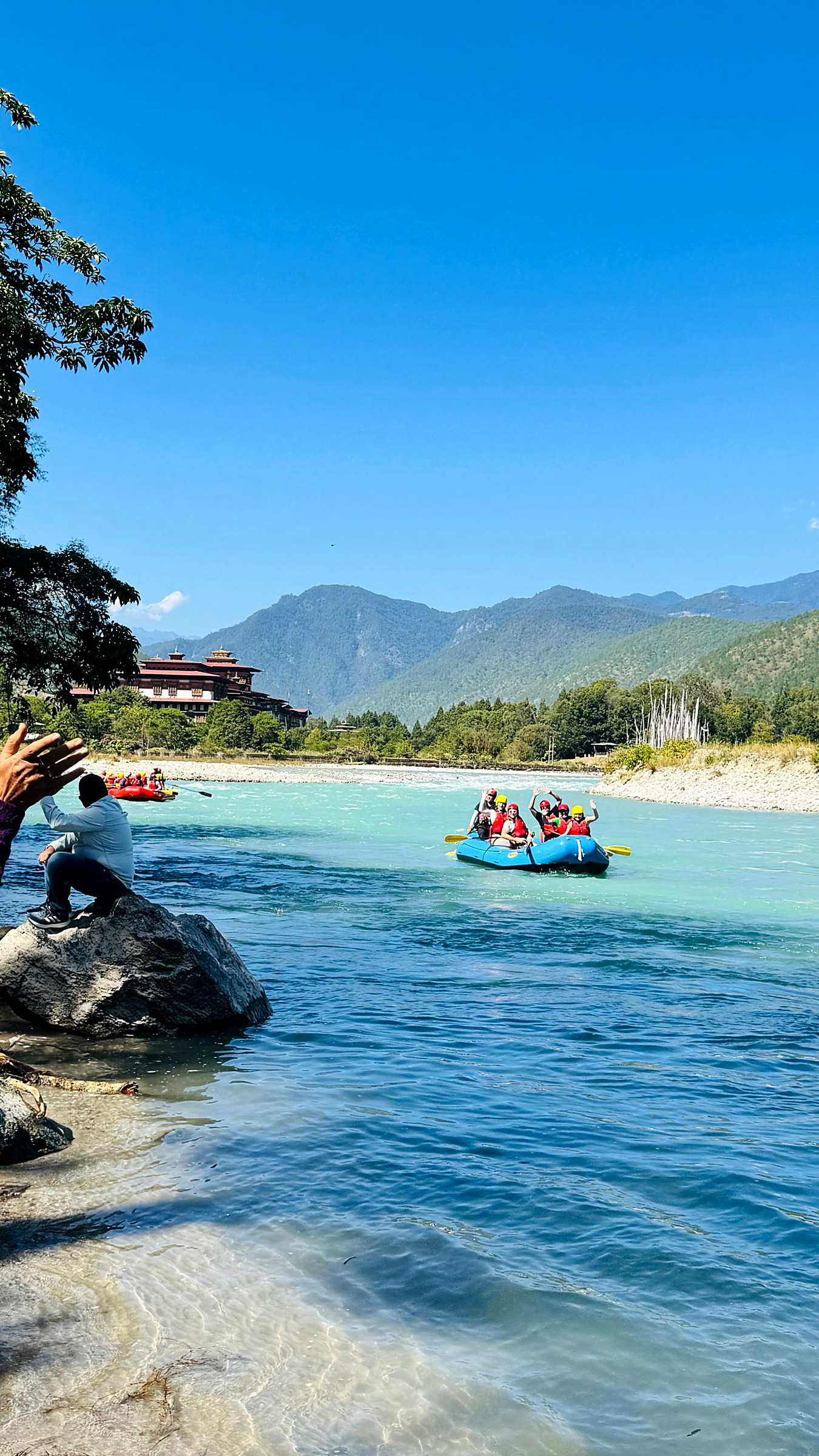Guests at the end of a rafting run in Punakha