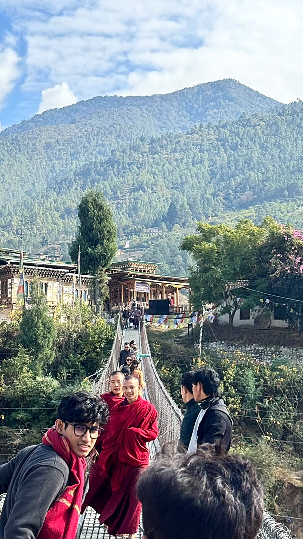 The river seen through the deck of the Punakha suspension bridge