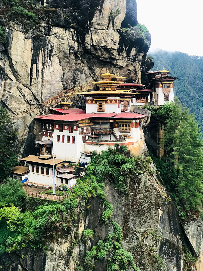 Close view of Paro Taktsang clinging to the granite cliff face